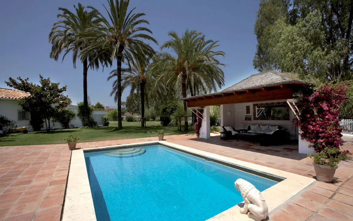 Rustic villa on the golf course with heated pool and bar shack. image 1