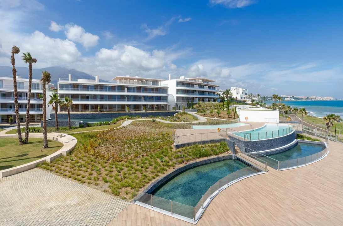 Property by the sea with luxury apartments and exclusive villas image 1
