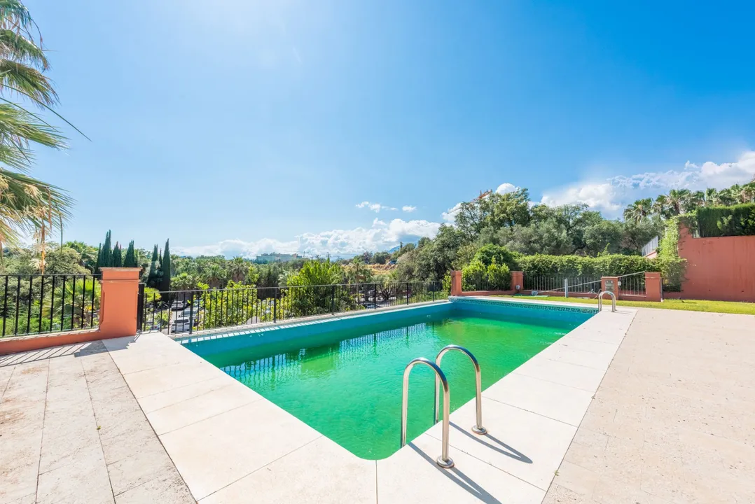 Independent chalet with pool and golf course views image 2