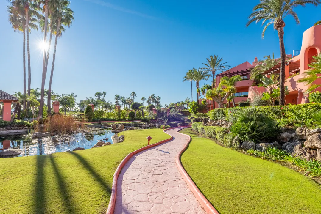 Exclusive Renovated Apartment with Private Garden in New Golden Mile image 0