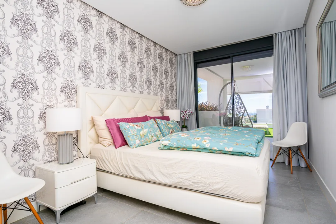 Luxury and Comfort in Artola: Apartment with Terrace and Views image 3